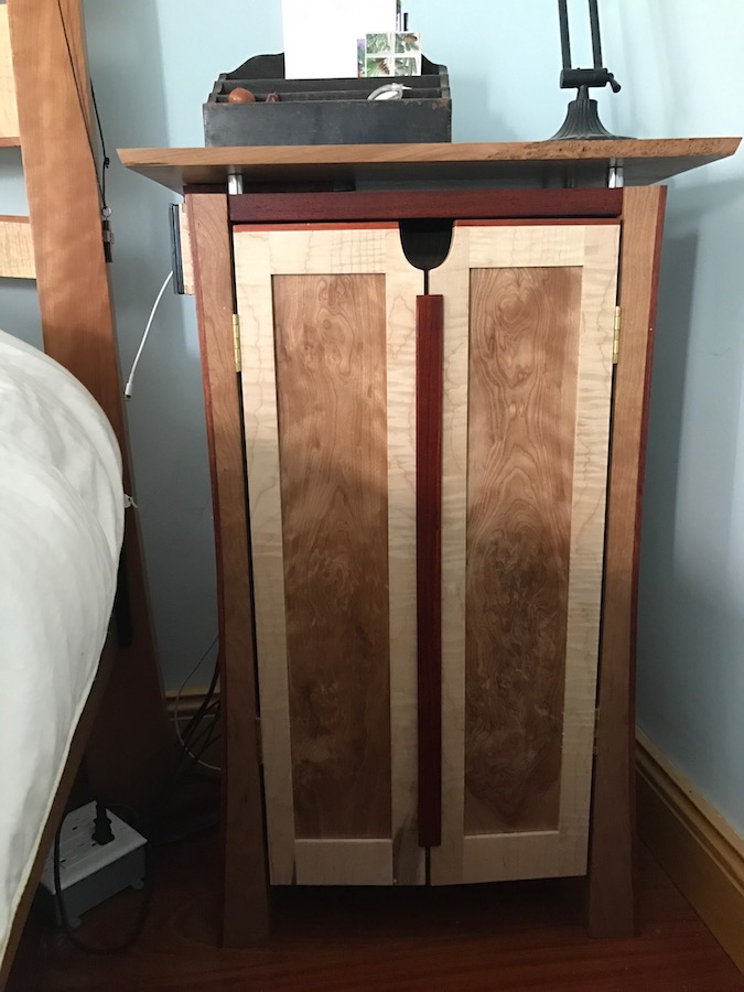 1 Mixed wood nightstand front view.jpg